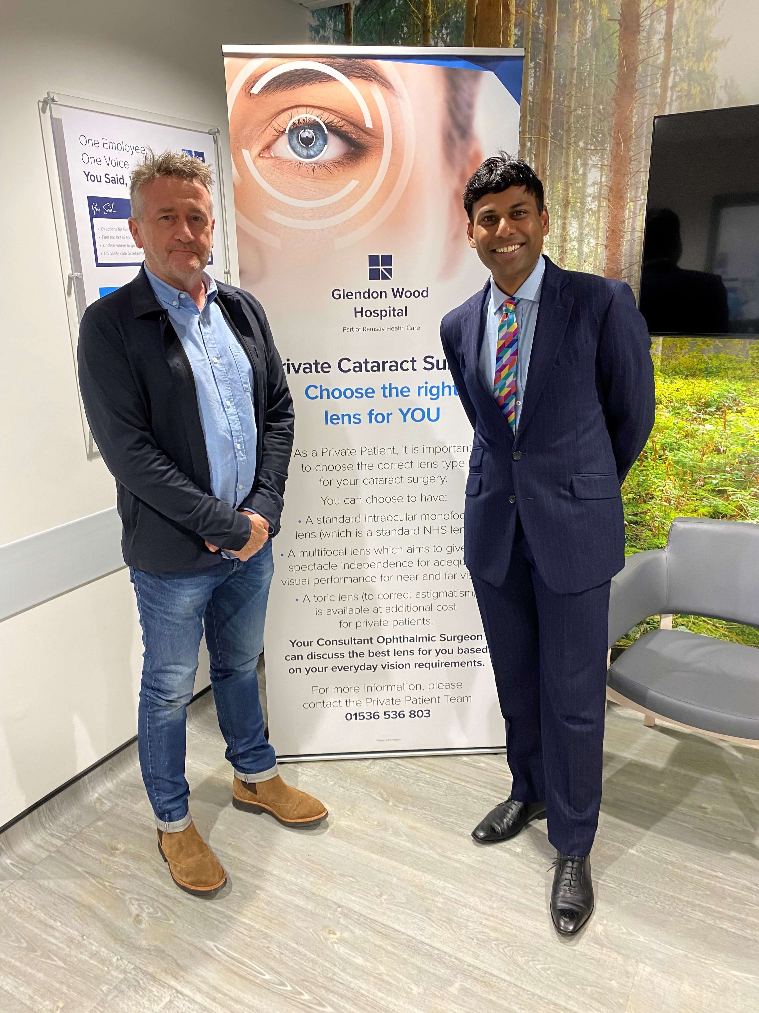 Two men smiling; patient Mr Upton with Consultant Ophthalmologist