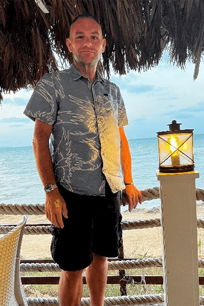 man smiling on beach