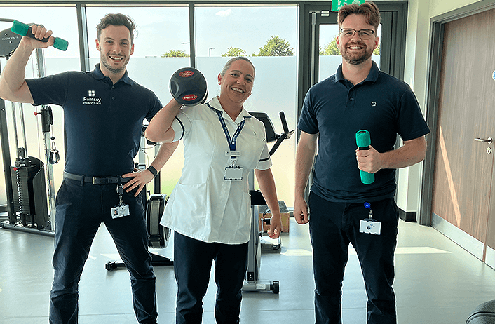 three physios smiling